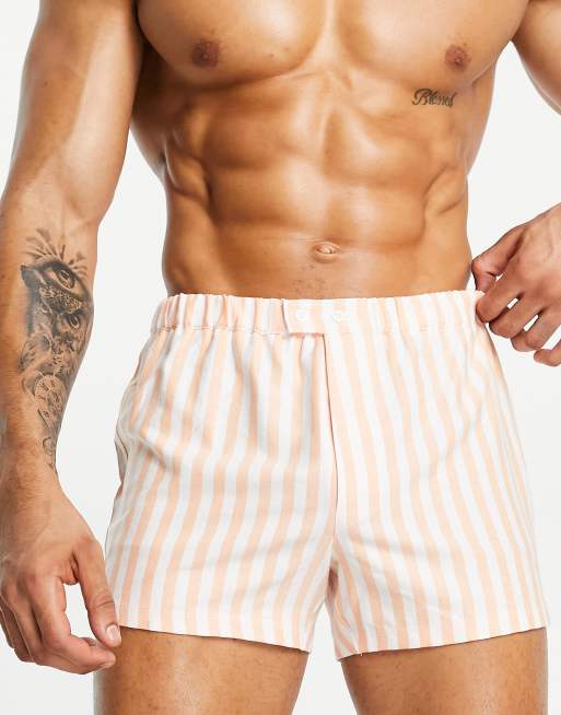 Calzoncillos bóxer a rayas naranjas con cierre de botón de ASOS DESIGN
