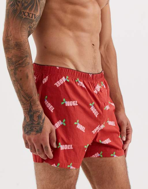 Calzoncillos rojos de Navidad con estampado en la parte trasera de ASOS  DESIGN