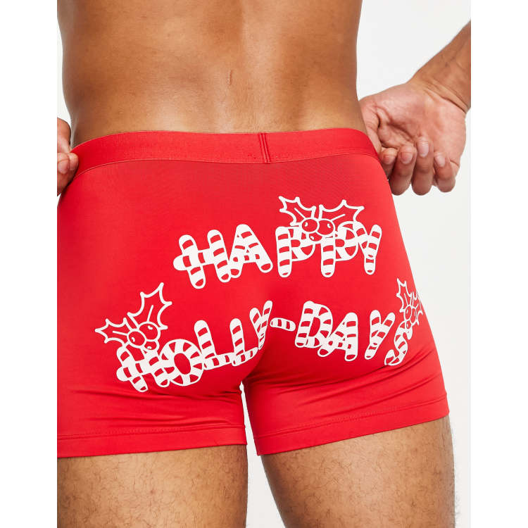 Calzoncillos rojos de Navidad con estampado en la parte trasera de ASOS  DESIGN