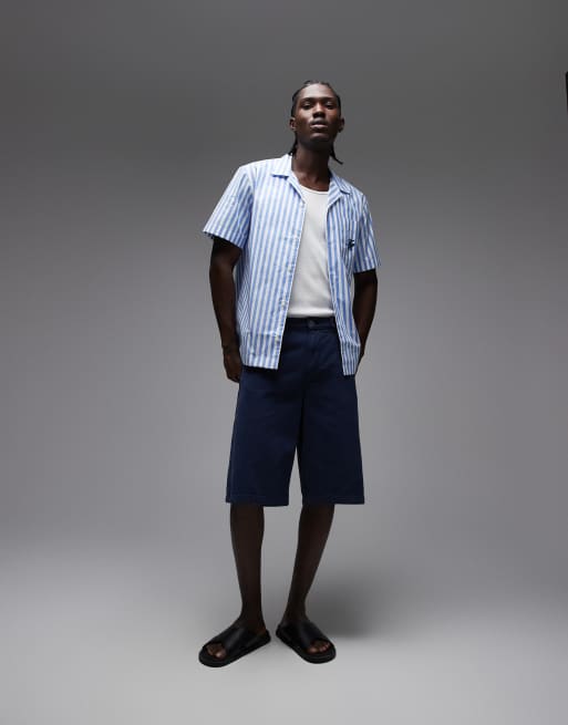Camisa a rayas azules de manga corta de tejido efecto papel de Tommy Hilfiger, 2 de 5
