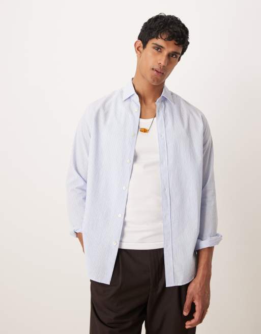 Camisa a rayas azules y blancas de manga larga de sirsaca de Mango