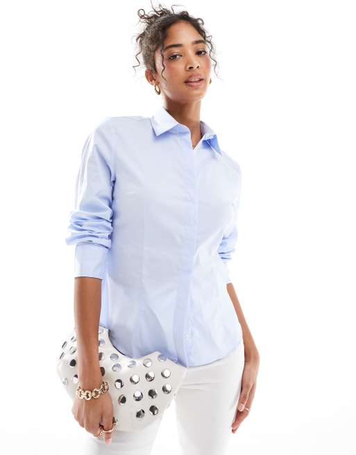Camisa azul claro de corte slim de Mango