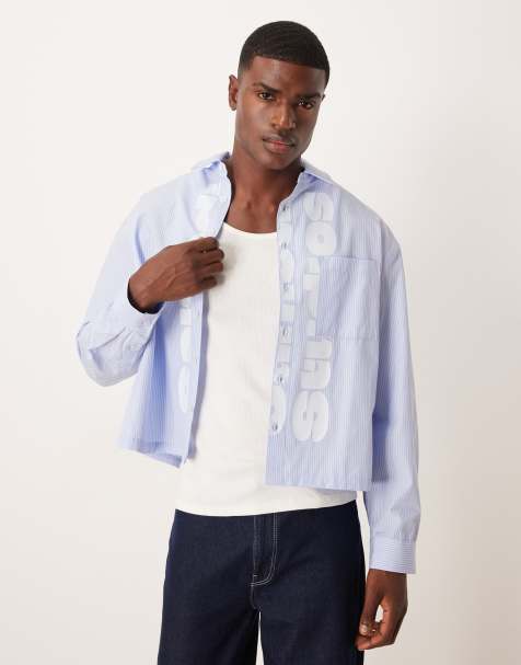 Camisa azul de corte cuadrado extragrande con estampado de raya diplomática y texto de ASOS DESIGN - view 1