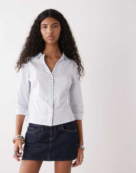 Camisa azul entallada con botones de COLLUSION - view 1