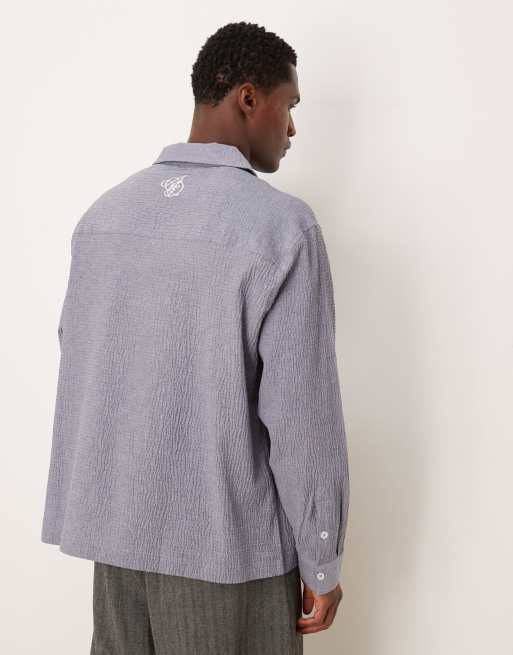 Camisa azul extragrande con bordado en la parte trasera del cuello de sirsaca de ASOS DESIGN, 3 de 5