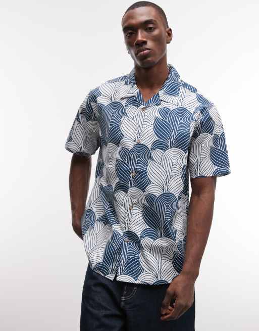 Camisa azul multicolor de manga corta con diseño estampado y botones Paragon de Parlez
