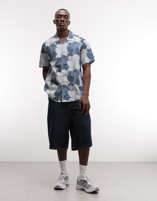 Camisa azul multicolor de manga corta con diseño estampado y botones Paragon de Parlez, 2 de 5