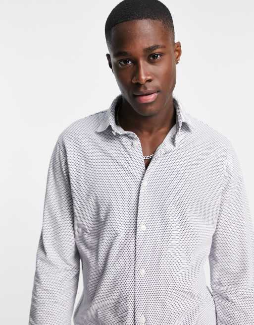 Camisa blanca a rayas de manga larga de Selected Homme