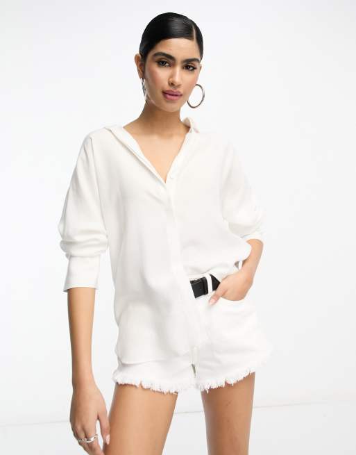 Camisa blanca abotonada de Mango 