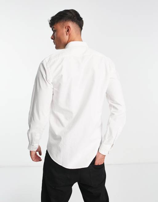 Camisa blanca scalpers online hombre