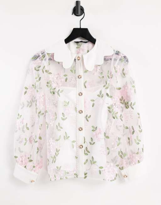 Camisa blanca con bordados florales de sister jane