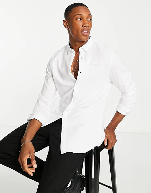 Hombre Other | Camisa blanca con logo pequeño de punto de Armani Exchange - ZP03211