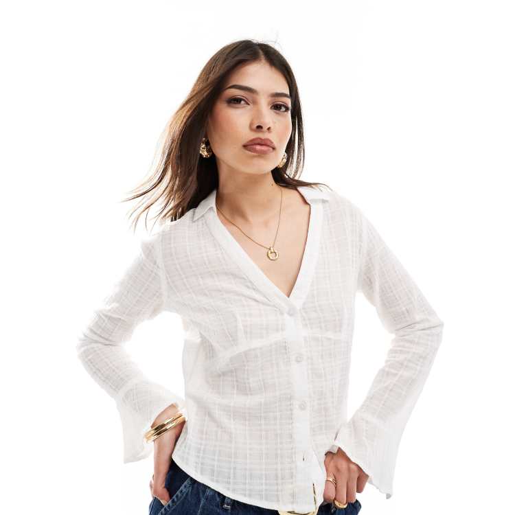 Camisa blanca abierta online