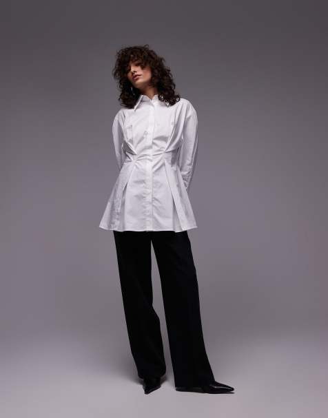 Camisa blanca estructurada de corte alargado con cintura ceñida de la colección cápsula de Mango - view 1