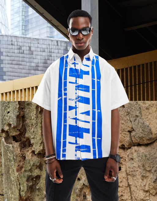 Camisa blanca holgada con estampado de texto de ASOS DESIGN