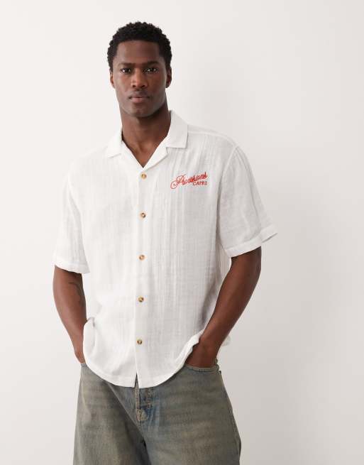 Camisa blanca holgada con estampado en la espalda y cuello de solapas de ASOS DESIGN, 5 de 5