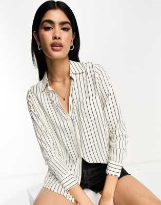 Camisa boyfriend beis a rayas de River Island