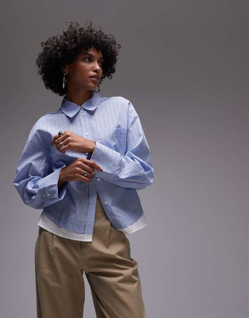 Camisa corta azul con bajo deshilachado de Mango