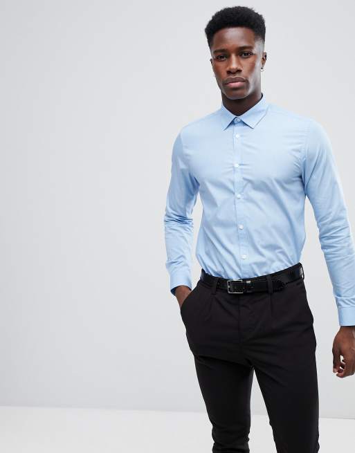 Camisa de corte estándar en popelina azul claro de New Look