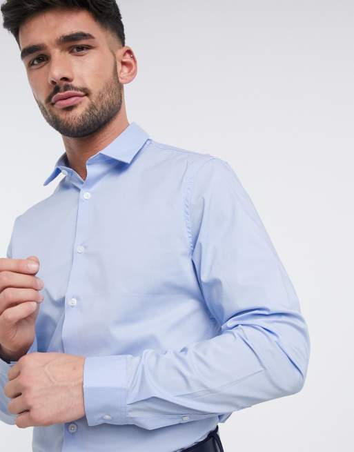 Camisa de corte slim con acabado elástico en azul de ASOS DESIGN, 2 de 4