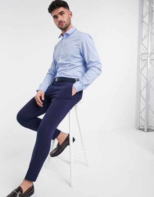 Camisa de corte slim con acabado elástico en azul de ASOS DESIGN, 3 de 4