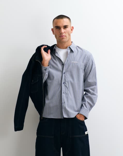 Camisa de manga larga a rayas negras y azules con bolsillo - view 1