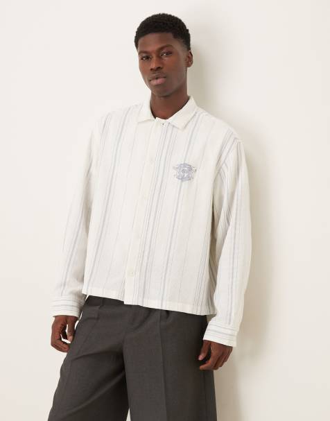 Camisa extragrande a rayas blancas y azules de punto trenzado de ASOS DESIGN - view 1