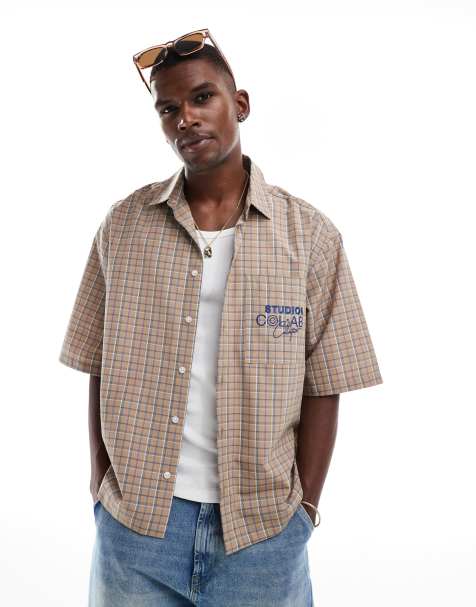 Camisa marrón a cuadros de corte cuadrado extragrande con estampado en el pecho de ASOS DESIGN - view 1