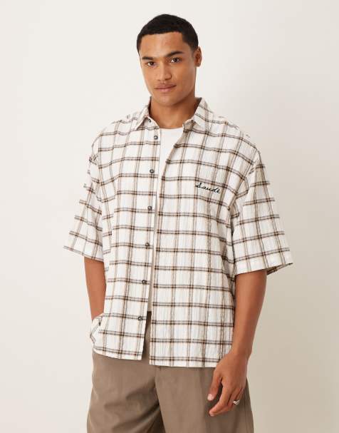 Camisa marrón a cuadros extragrande con bordado en el pecho de ASOS DESIGN - view 1