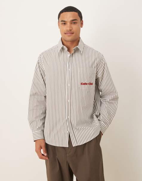 Camisa marrón a rayas holgada con bordado en el pecho de popelina de ASOS DESIGN - view 1