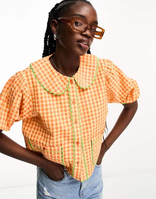 Camisa na cuadros vichy naranjas abotonado con detalles ondulados de Neon Rose