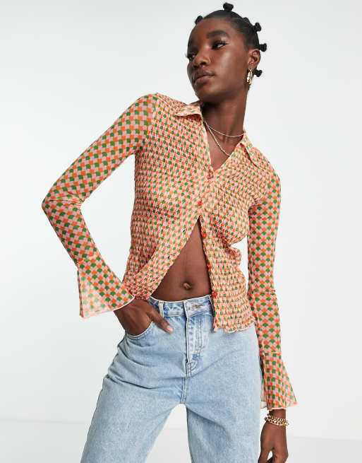 Camisa naranja fruncida estilo años 60 de River Island