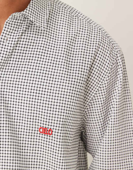 Camisa negra a cuadros de corte cuadrado extragrande con bordado en el pecho de ASOS DESIGN, 5 de 5