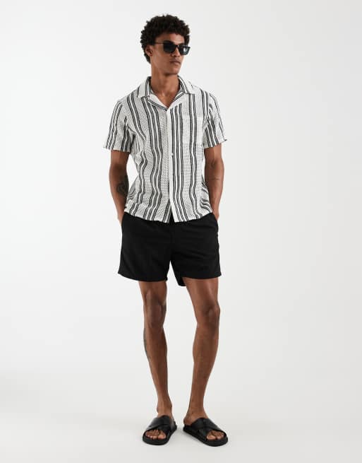 Camisa negra a rayas de croché de South Beach, 2 de 5