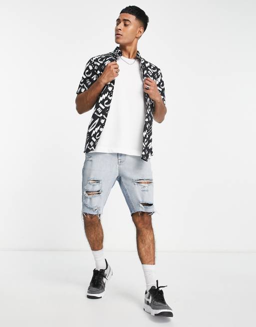Camisa negra con estampado abstracto de corte slim y tejido elástico de ASOS DESIGN, 4 de 4