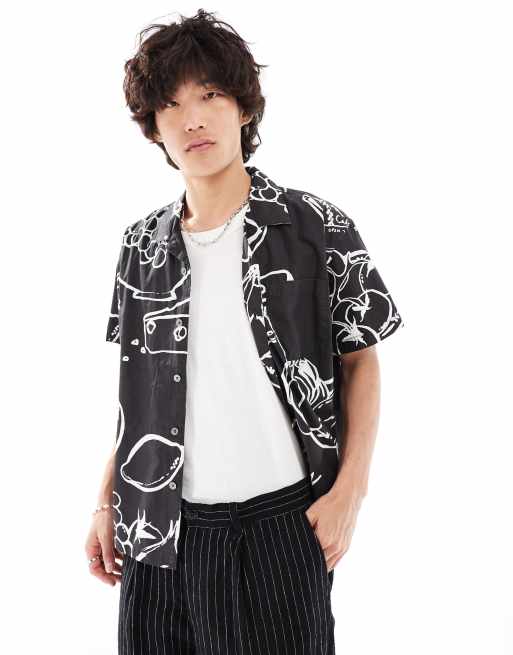 Camisa negra de manga corta con estampado de naturaleza muerta de Obey, 3 de 4