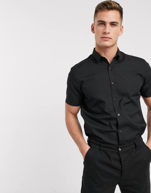 Camisa negra de botones best sale manga corta