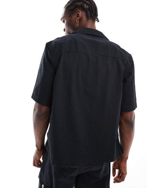 Camisa negra de manga corta de sirsaca de Calvin Klein Jeans, 4 de 4