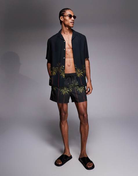 Camisa negra holgada con cuello de solapas y estampado de palmeras de ASOS DESIGN (parte de un conjunto) - view 1
