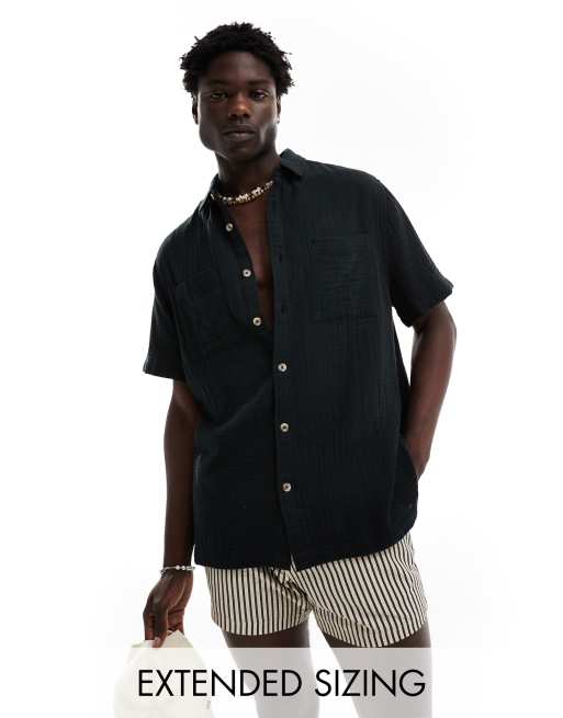 Camisa negra holgada de manga corta con cuello de solapas de tejido texturizado de ASOS DESIGN