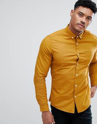 Camisa Oxford de corte slim casual en color mostaza de ASOS DESIGN