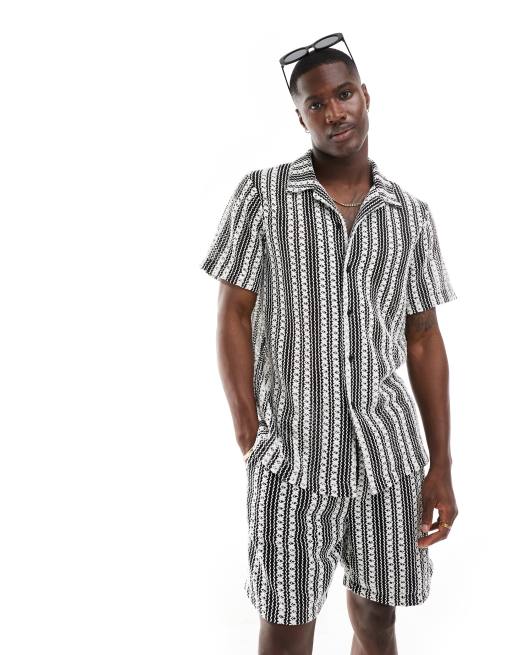 Camisa playera a rayas blancas y negras de croché de South Beach (parte de un conjunto)