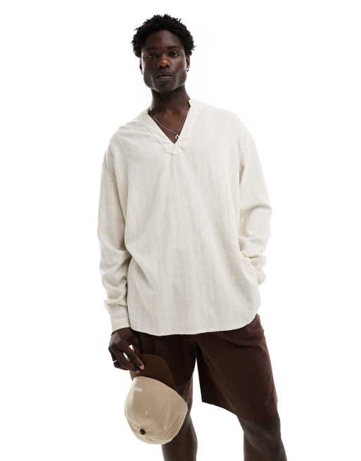 Camisa playera beis extragrande estilo años 90 sin cierres de ASOS DESIGN