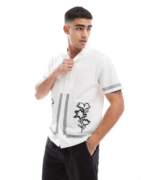 Camisa playera blanca estilo resort con diseño bordado de Aray - view 1