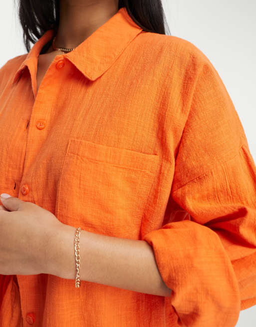 Camisa playera naranja abotonada de tejido texturizado de ASOS DESIGN (parte de un conjunto), 2 de 4