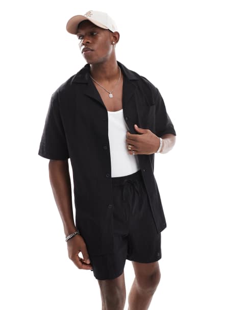 Camisa playera negra de manga corta de tejido texturizado de Sol Beach - view 1