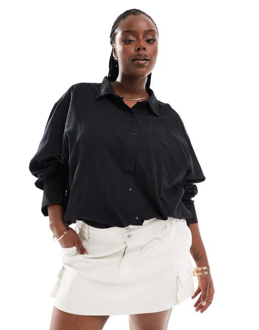 Camisa playera negra extragrande de tejido liso de COLLUSION Plus
