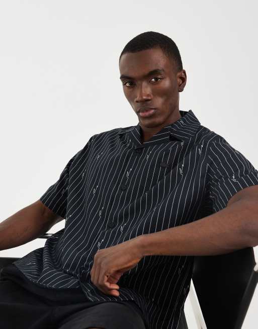 Camisa resort negra a rayas de manga corta con estampado integral de cocodrilo de Lacoste , 2 de 5