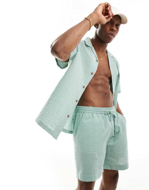Camisa verde salvia extragrande de manga corta estilo años 90 de sirsaca texturizada de ASOS DESIGN (parte de un conjunto)