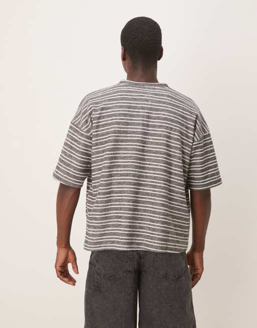 Camiseta a rayas extragrande con cuello panadero y hombros caídos de canalé de ASOS DESIGN, 2 de 4